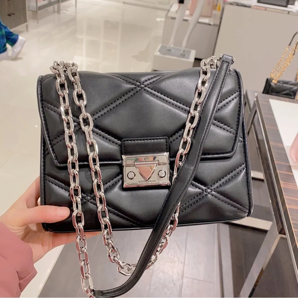 Michael Kors Serena Quilted Medium Flap Shoulder Bag in black/sliver